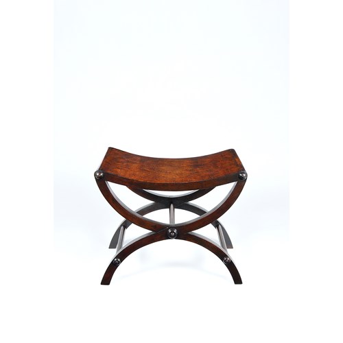 A fine mahogany X framed stool